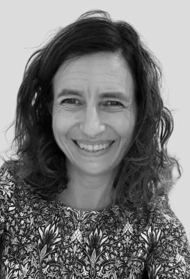 A close-up black and white portrait of Kate Griffiths